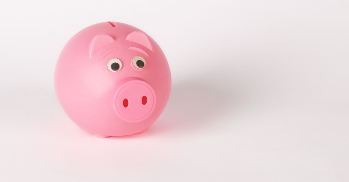 A pink piggy bank against a clean white background, representing a starter emergency fund
